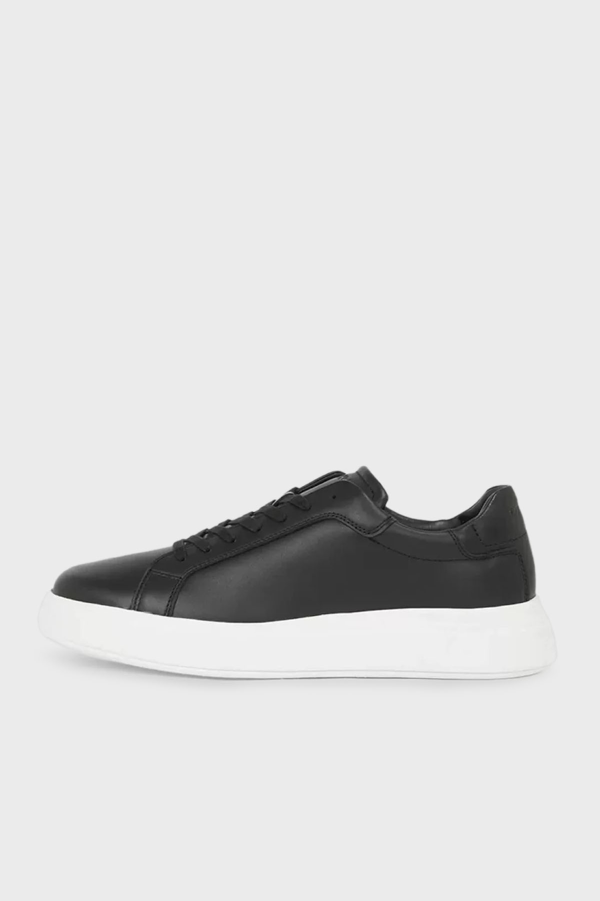 Calvin Klein Deri Logolu Kalın Taban Sneaker  HM0HM01016BEH Erkek Ayakkabı HM0HM01016 BEH SİYAH